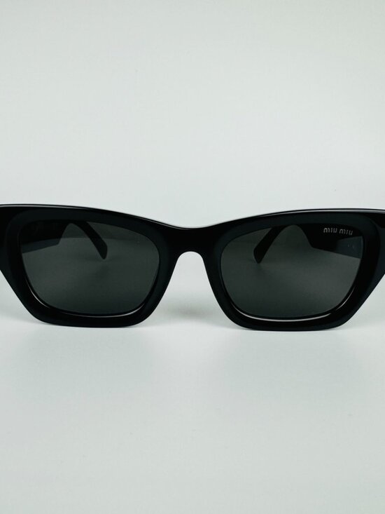 ✨ Miu Miu SMU 09W Black Sunglasses with Iconic Gold Logo Accents ✨